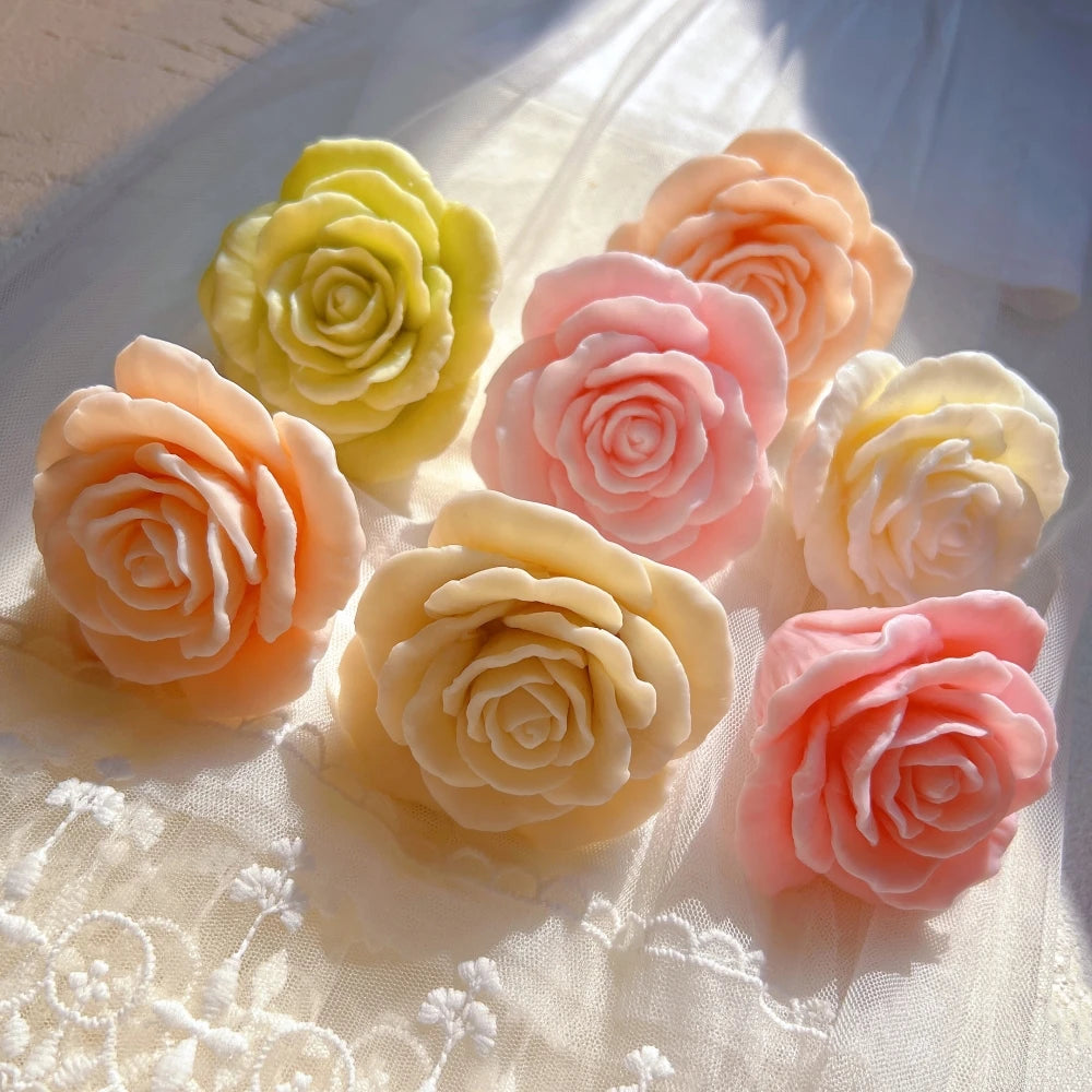 Rose flower candle samples showing layered open petals