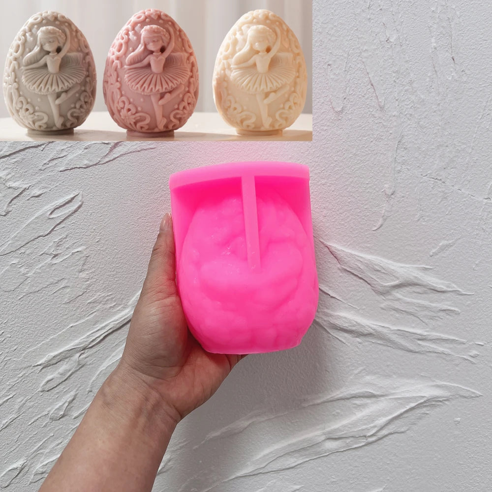 Pink silicone ballerina egg mold beside finished examples