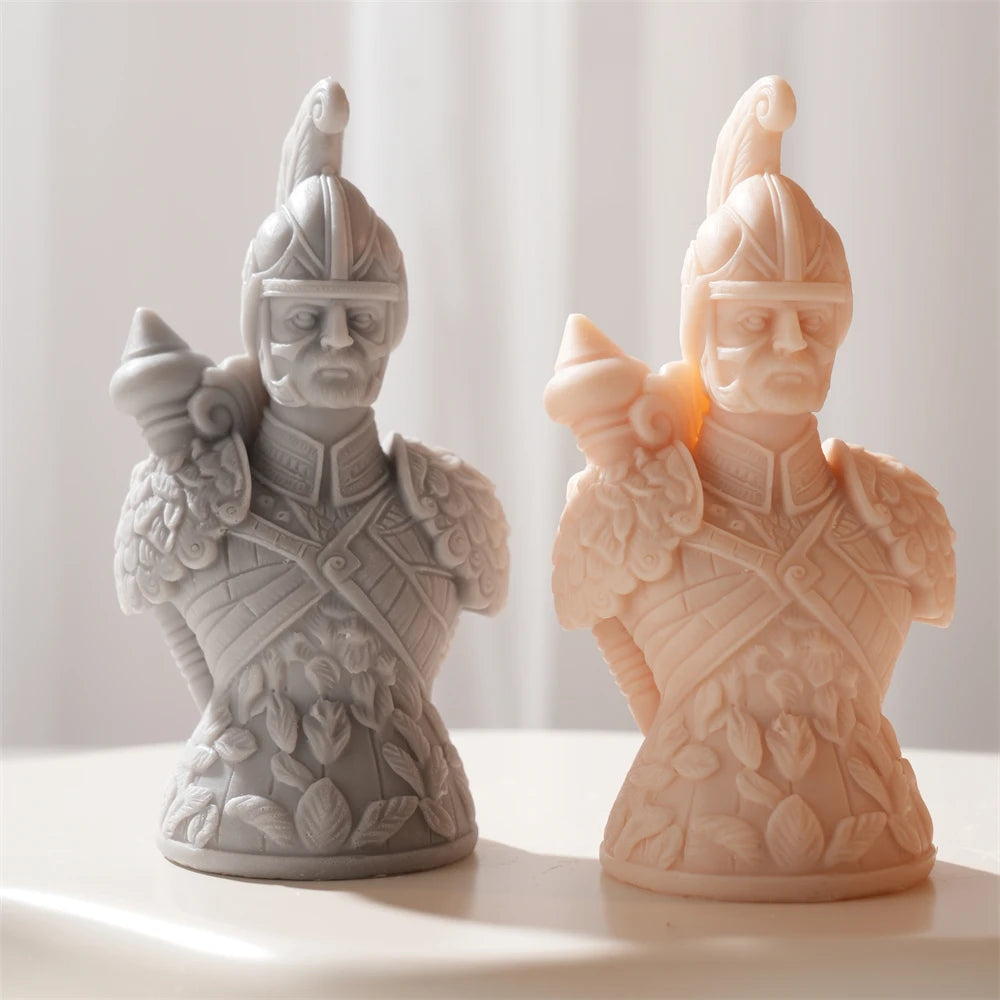 Two helmeted chess figure castings with crested helmets and armor