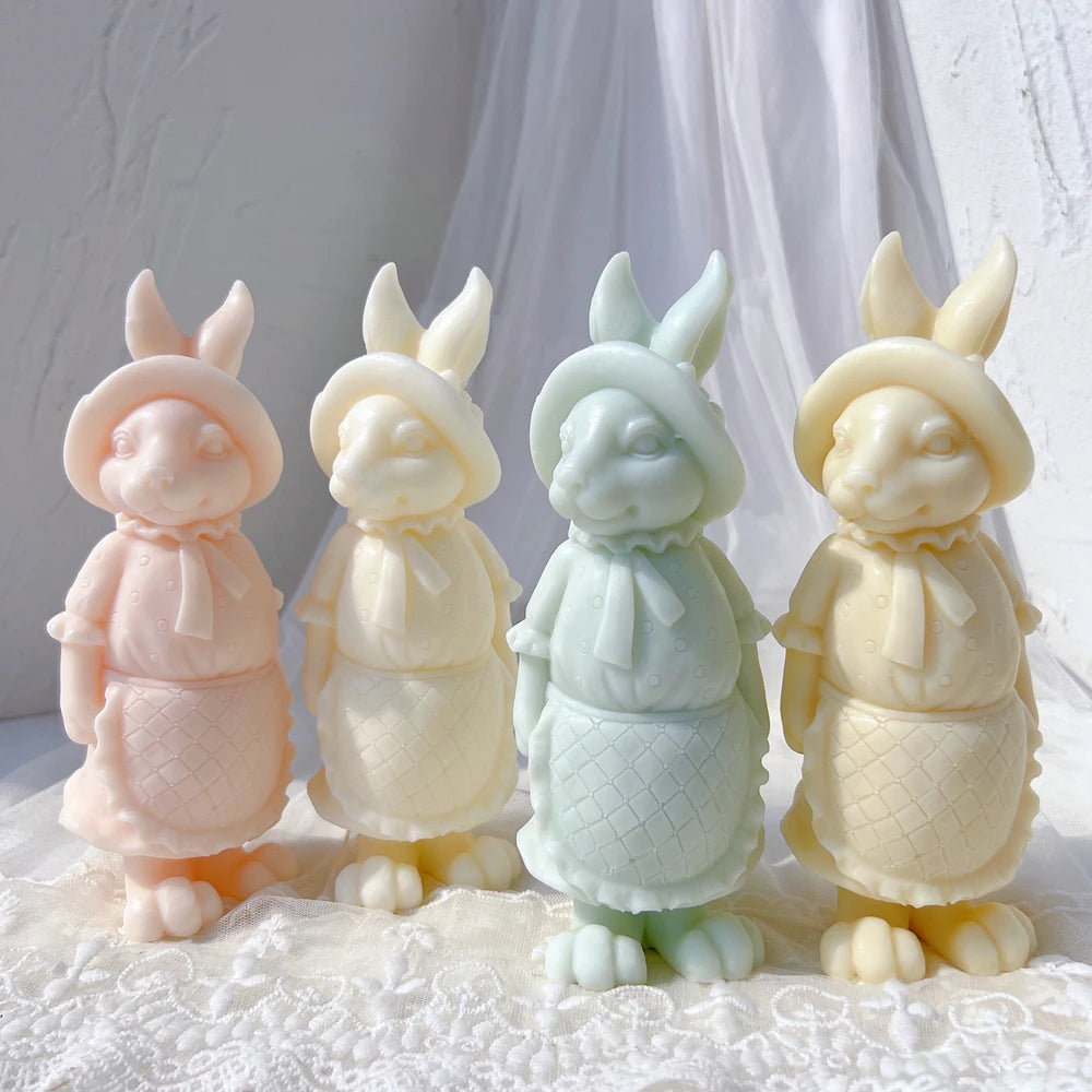 Apron rabbit castings arranged on a textured fabric surface