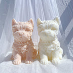 Peach and cream seated terrier castings with pointed ears and shaggy muzzles