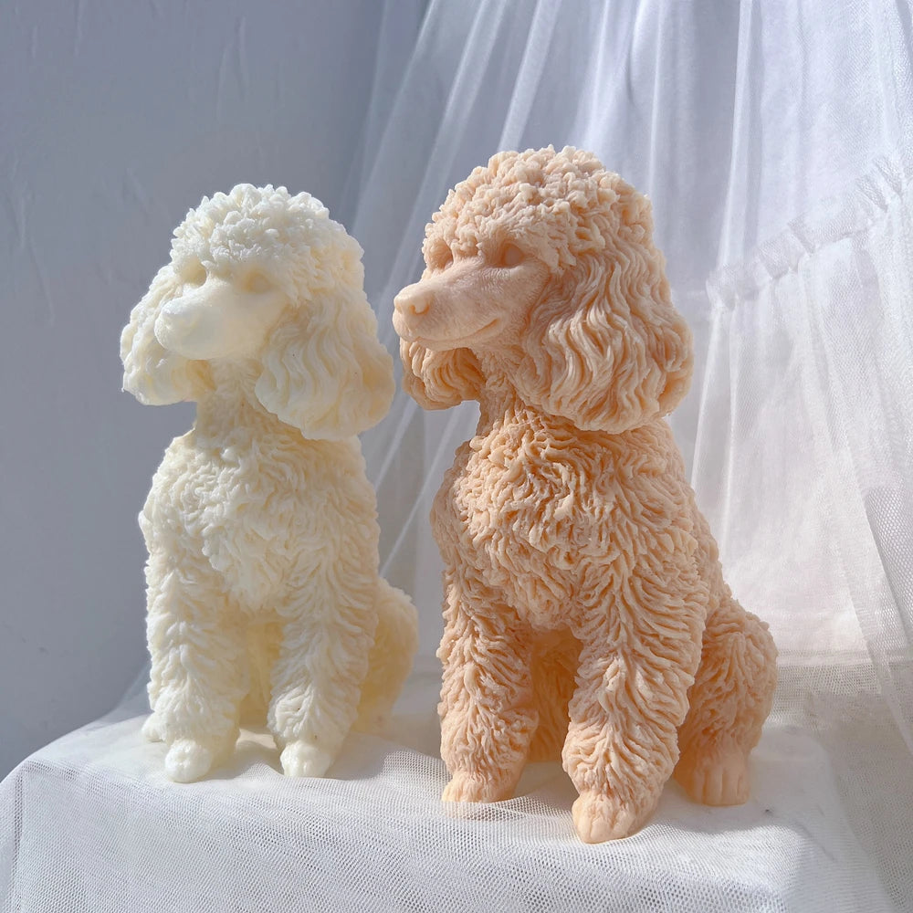 Poodle figurine castings showing long ears and textured fur
