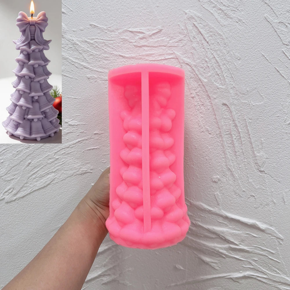Pink silicone bell garland tree mold held open