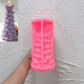 Pink silicone bell garland tree mold held open