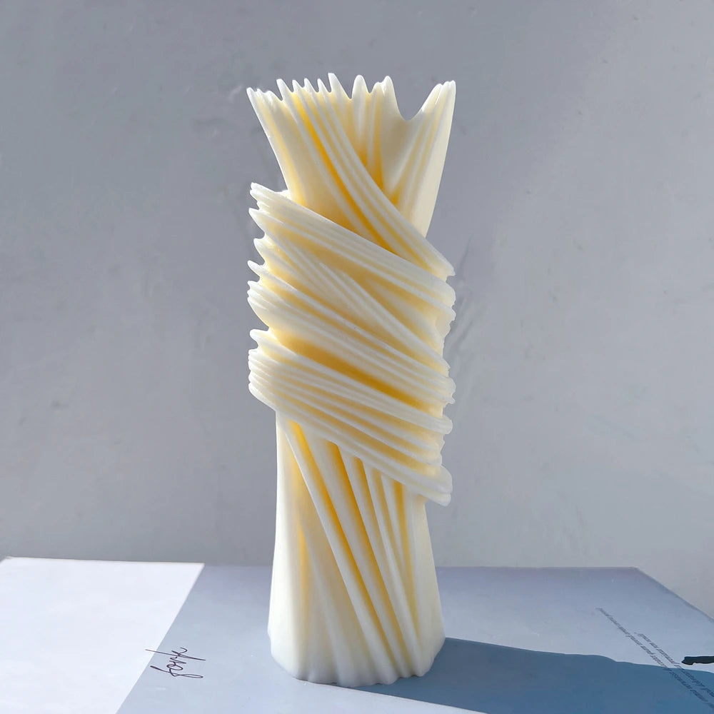 Opposite side view of a ribbon pillar casting with diagonal wrapping