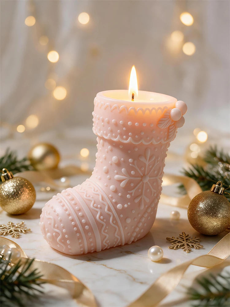 Pink Christmas stocking candle with knit texture and cuff