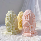 Three egg-shaped houses with small covered entrances
