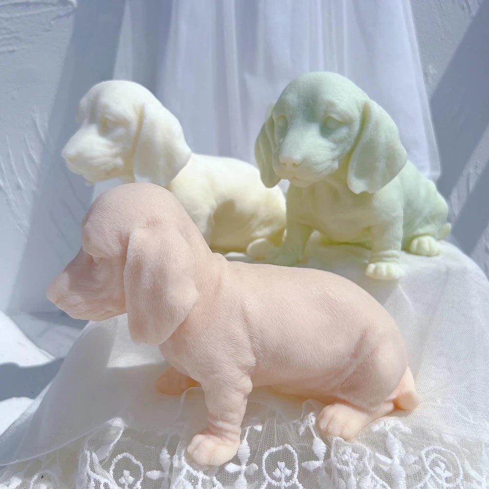 Low seated puppy figures in peach cream and green
