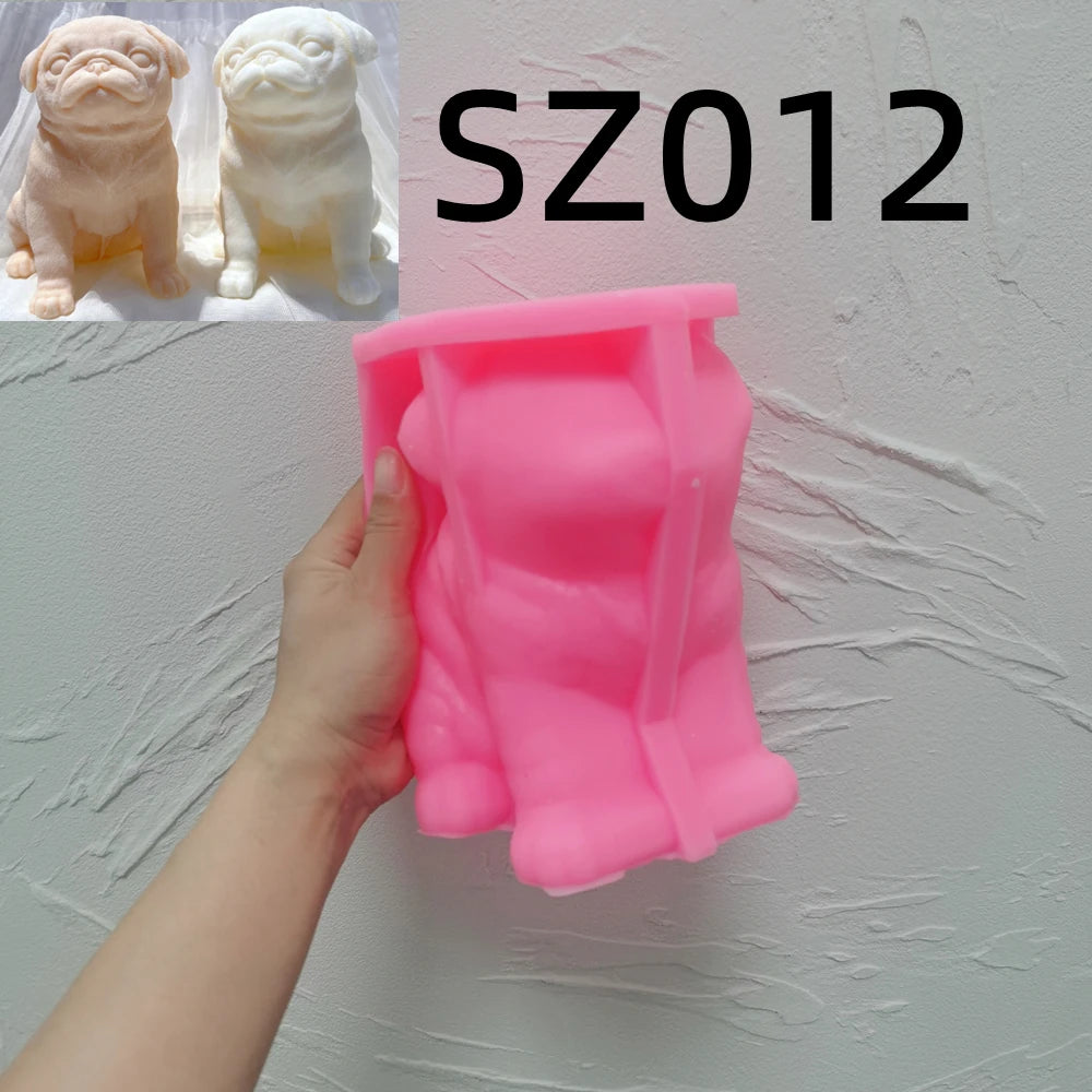 Pink pug silicone candle mold held in one hand