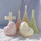 Rose hearts and cross with tall candles in the background