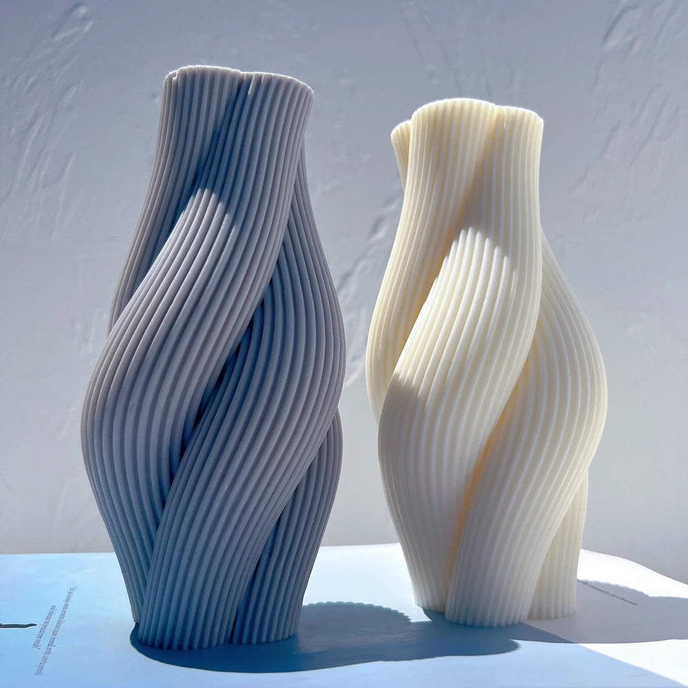 Fine-ribbed sculptural pillars showing curved sides