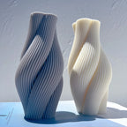 Fine-ribbed sculptural pillars showing curved sides