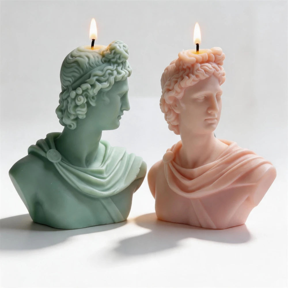 Green and pink curly-haired portrait busts
