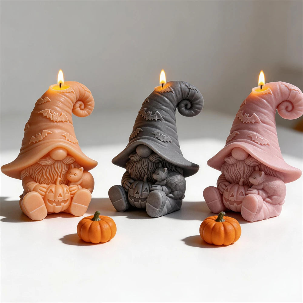 Orange, gray and pink bat hat gnome candles with jack-o'-lanterns