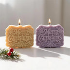 Gold and purple Merry Christmas sign candles with floral borders