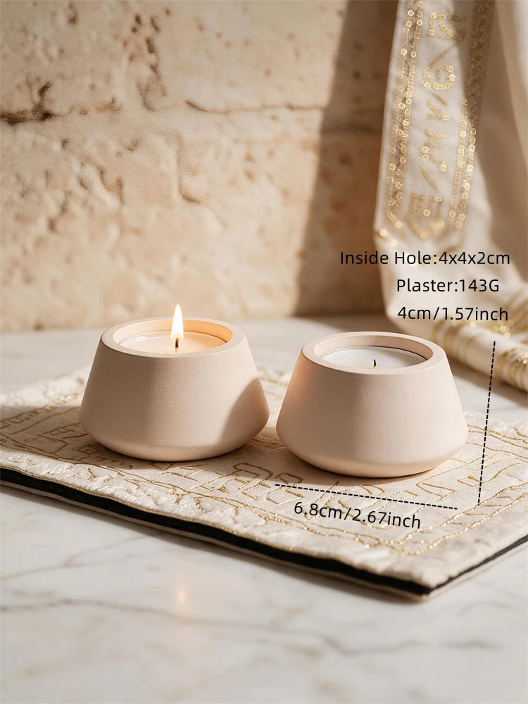 Low round and tapered decorative candle holders with flame motif