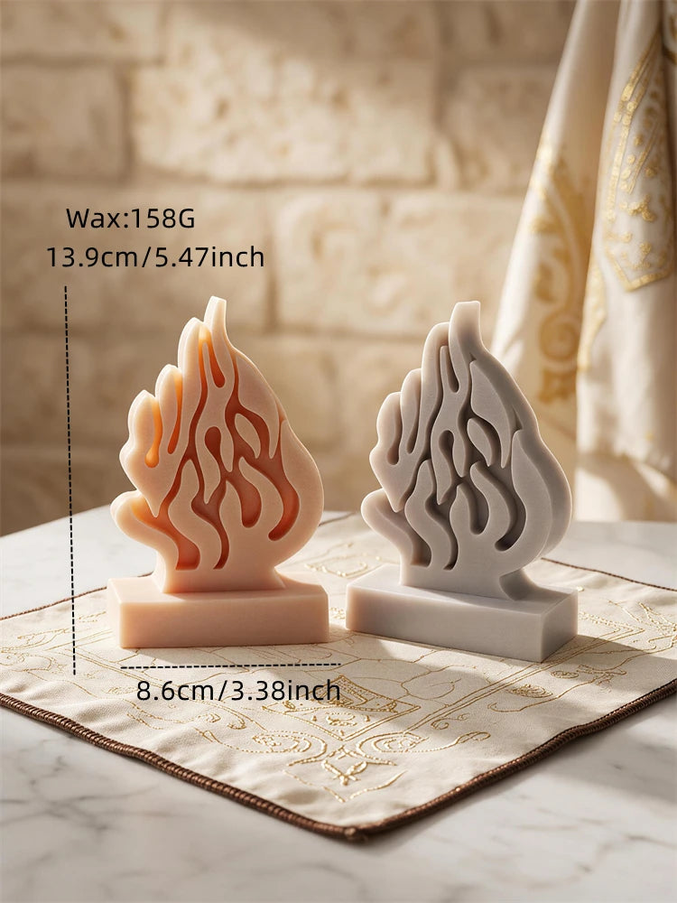 Size reference for flame sculpture: 13.9 cm tall, 8.6 cm wide, 158 g wax