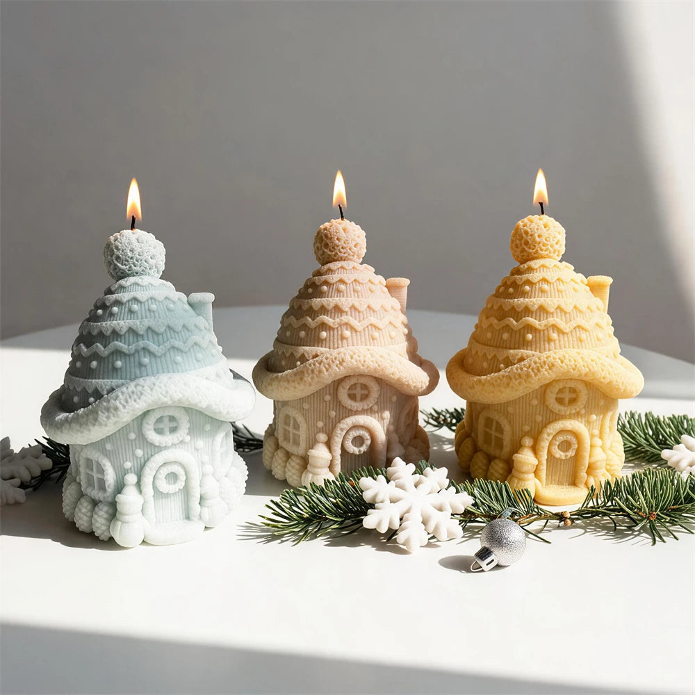 Three cottage candle samples arranged beside festive greenery