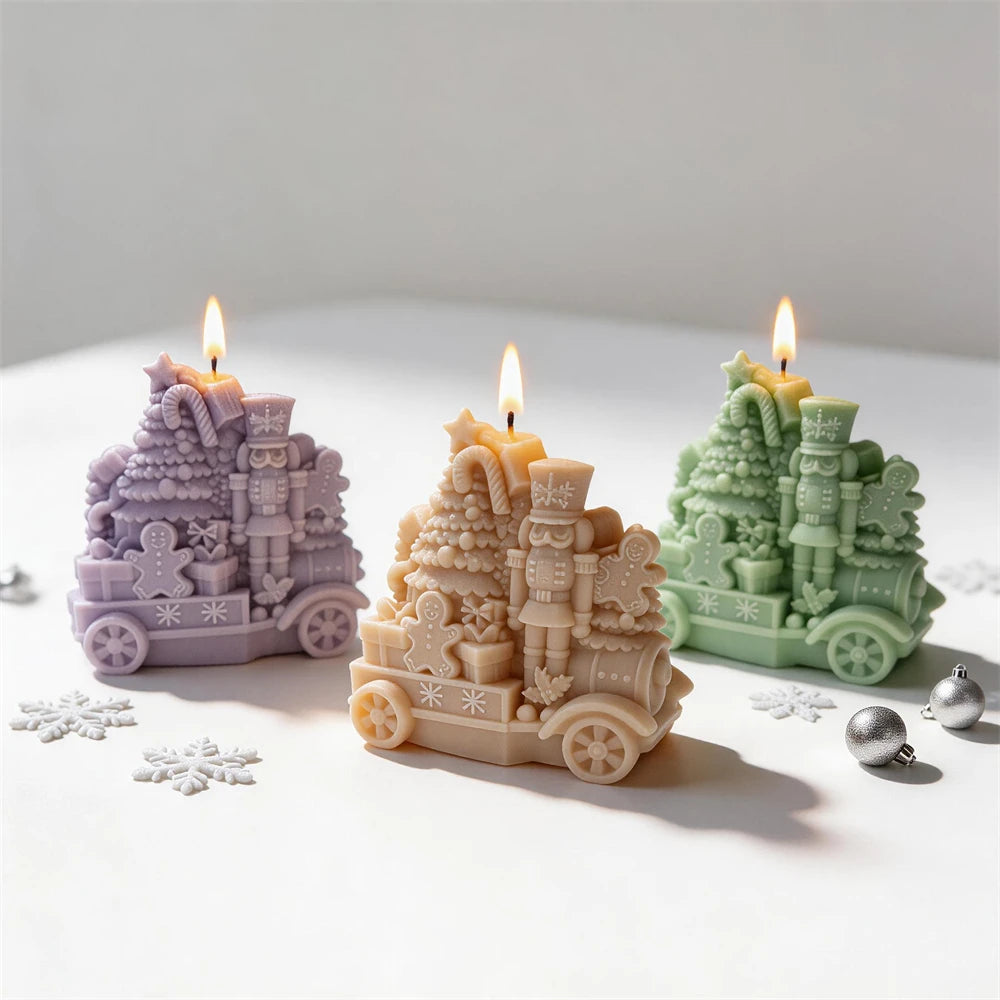 Purple yellow and green Christmas train candles with nutcrackers and trees