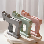 Three Chai multi-candle holders with open-frame silhouettes