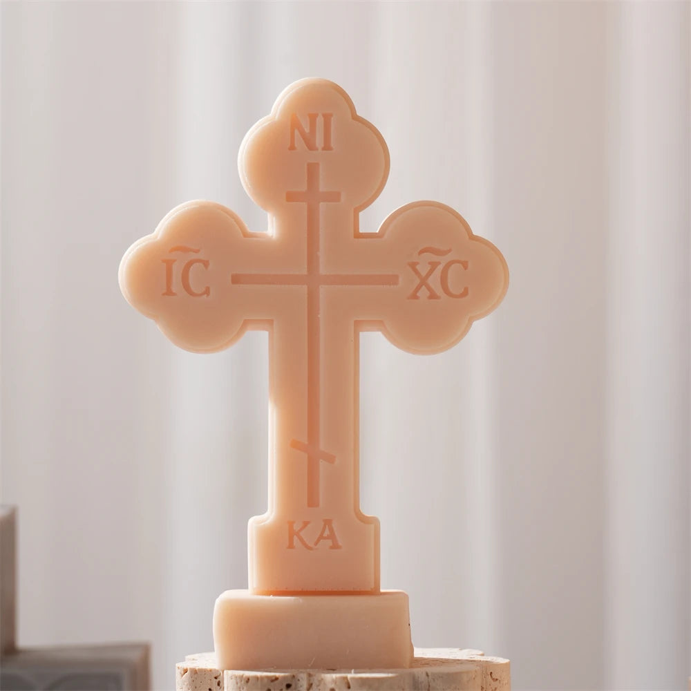 Peach rounded-end cross casting with an integrated base
