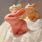 Angled rabbits showing textured chests and rounded haunches