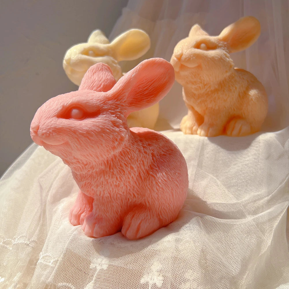 Angled rabbits showing textured chests and rounded haunches