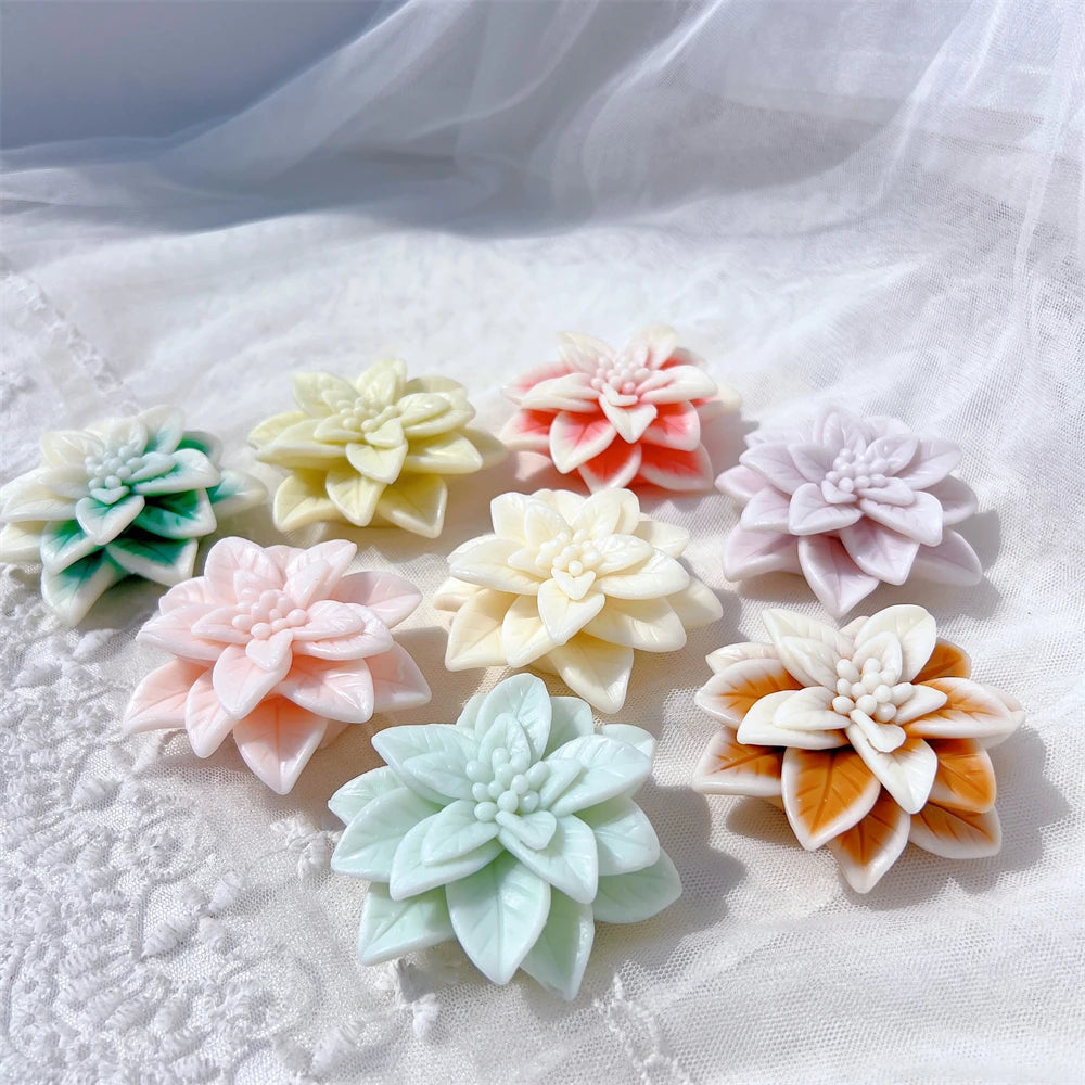 Angled view of pastel pointed-petal flower castings
