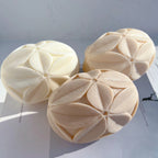 Top and side views of the leaf-pattern geometric castings