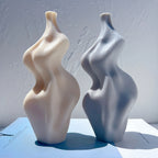 Angled view of smooth fluid twist candle castings