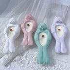 Front view of seal tea light holders in pastel colors