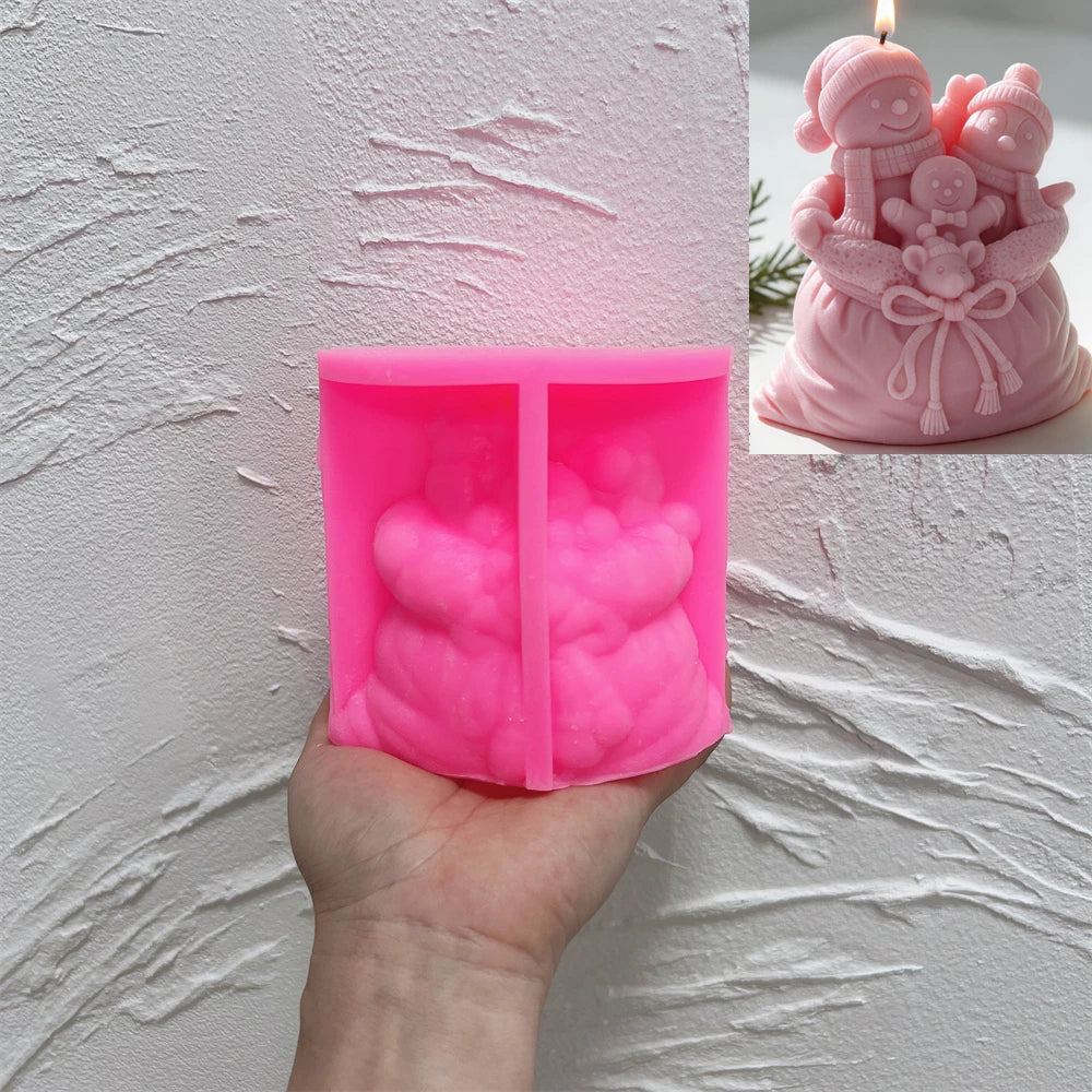 Pink silicone snowmen-and-gingerbread gift-sack mold