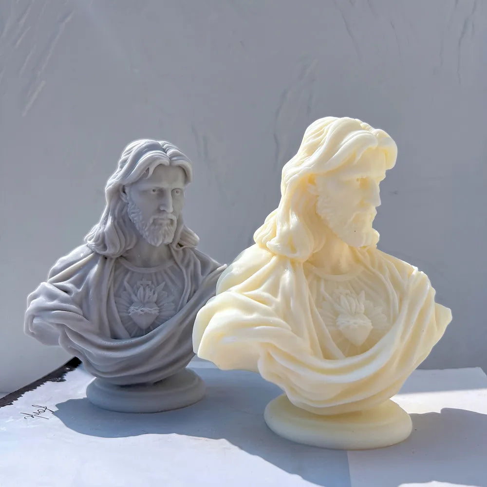 Side and front views of two Sacred Heart busts