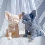 Cream and dark Chihuahua-style puppy castings with rounded eyes