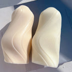 Close-up of two ribbed wave casting surfaces