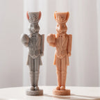 Gray and peach rabbit soldiers with decorated hats and boots