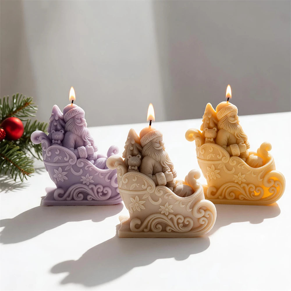 Angled view of ornate sleigh candles and sculpted Santa figures