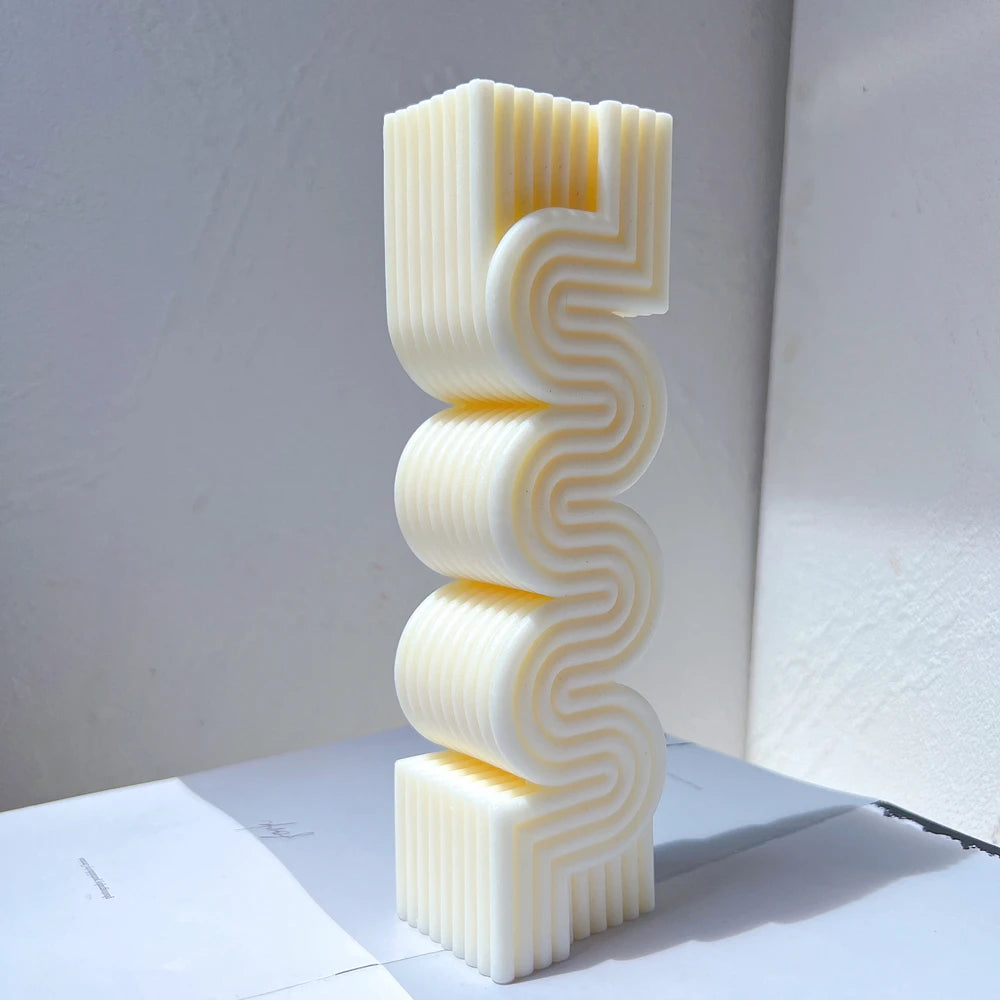 Angled view of tall ribbed serpentine pillar casting
