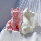 Pink terrier front view beside a cream rear view with curled tail