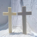 Two upright plain cross castings in cream and gray