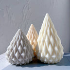 Gray peach and cream cone candles with raised geometric facets