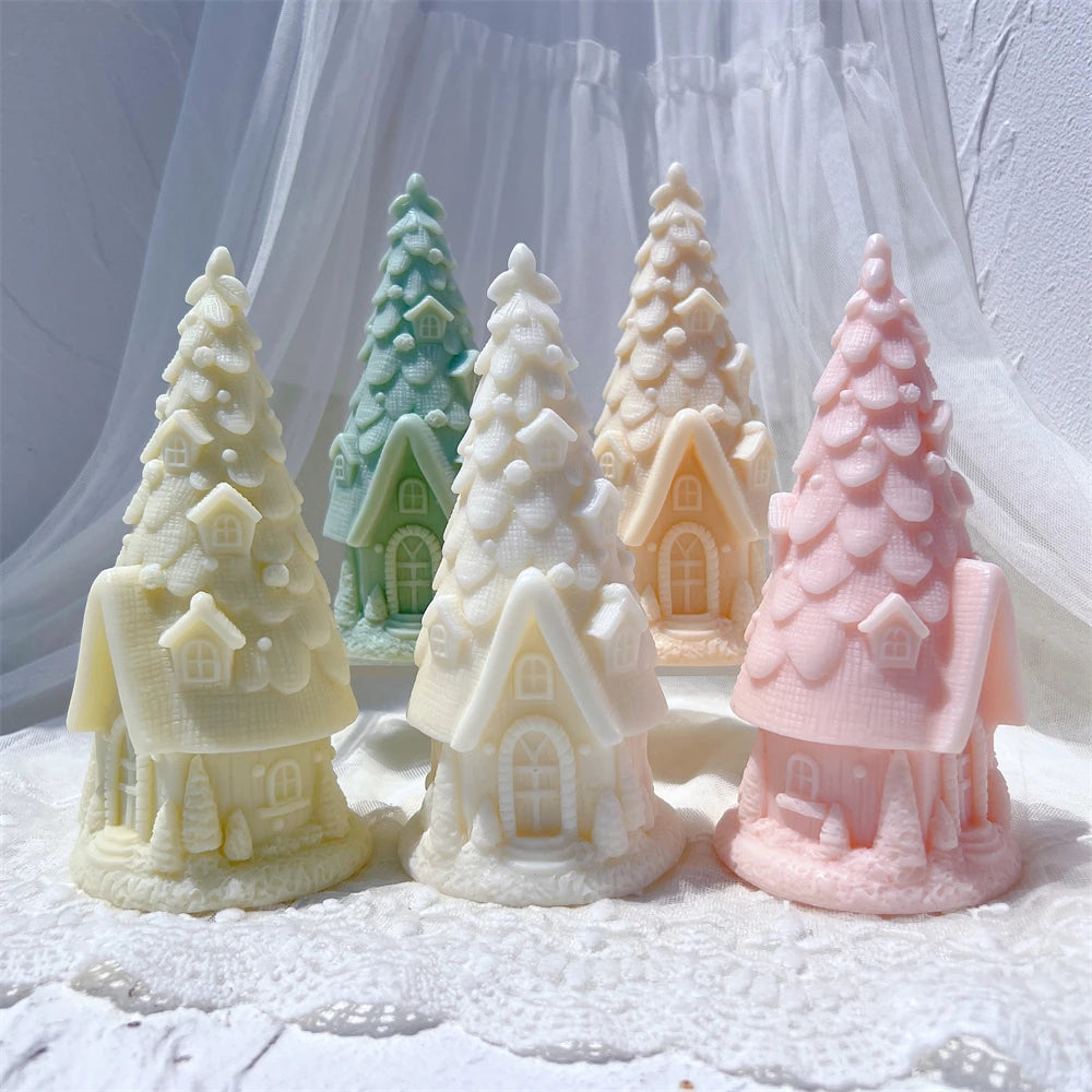 Close view of tree branches above miniature cottage entrances