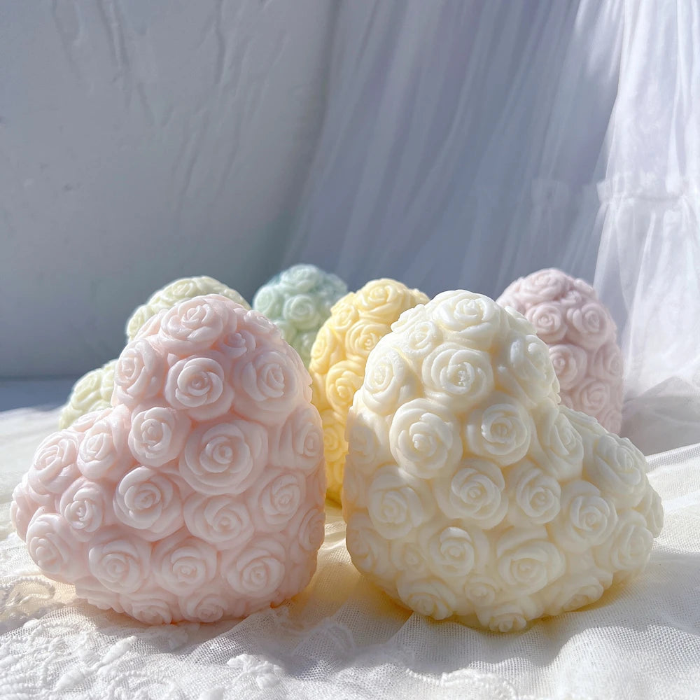 Pink and ivory heart castings covered in rose blooms