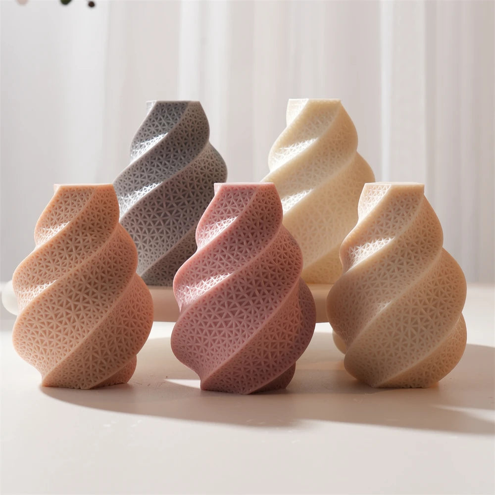 Display of swirl candle examples at different heights