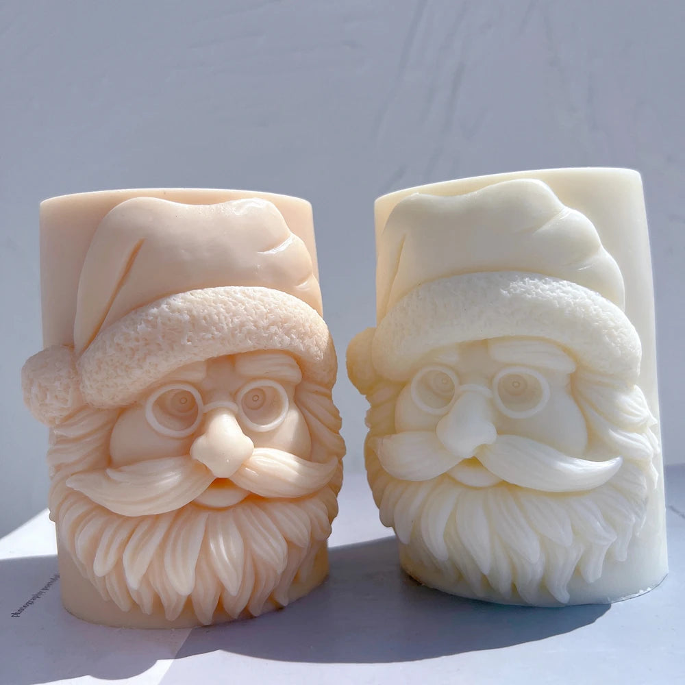 Pair of Santa portrait pillars viewed from the front