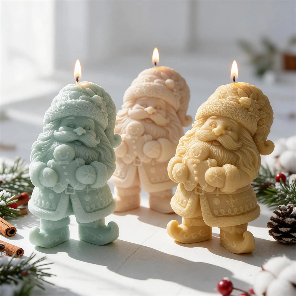 Three gnome candles holding gingerbread men