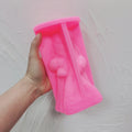 Pink silicone mold for long buttoned-coat Santa figure