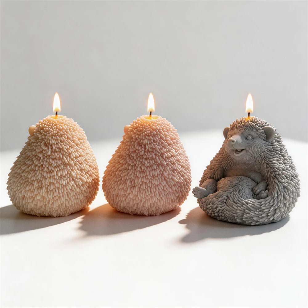 Two rounded hedgehog spiny backs and one smiling front face