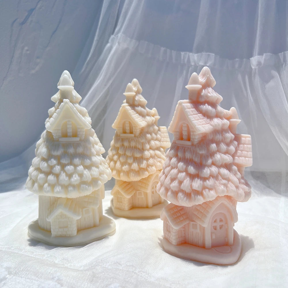 Three tree cottage castings in cream, gold and pink