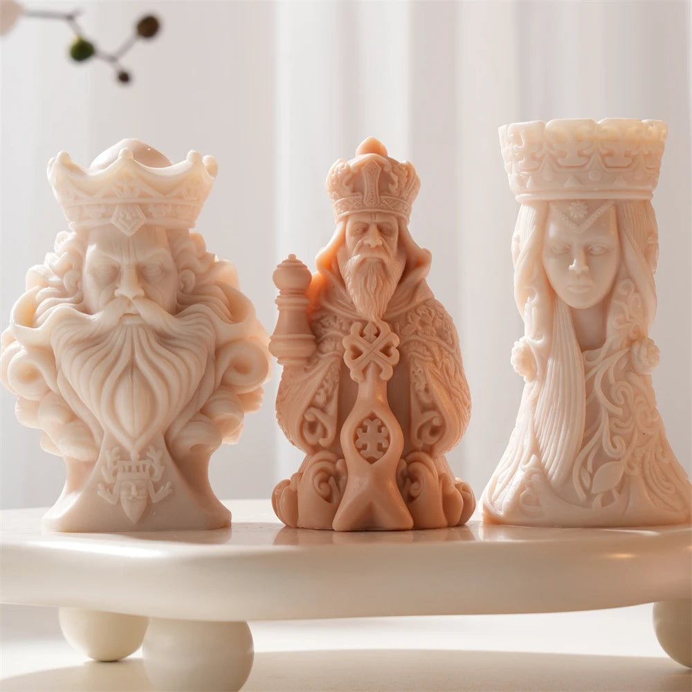 King bearded figure and rook castings arranged together